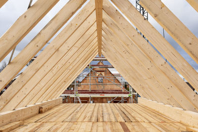 Low angle view of wooden ceiling of building