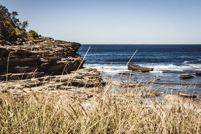 Scenic view of sea against clear sky