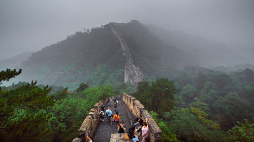 People walking on mountain peak