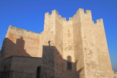 Low angle view of historical building against clear sky