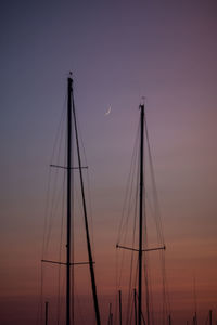 Sailboat against sky at dusk