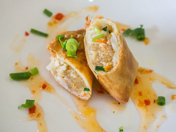 High angle view of thai spring rolls served in plate