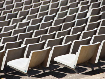 High angle view of empty chairs in stadium