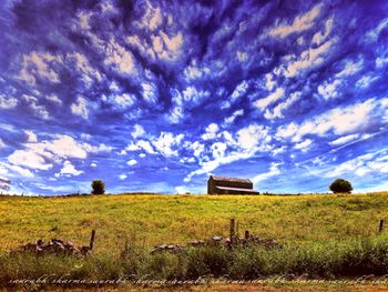 Scenic view of landscape against blue sky