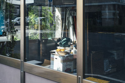 Reflection of glass window on display at store