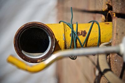 Close-up of yellow metallic pipe