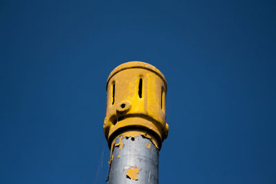 Low angle view of building against blue sky