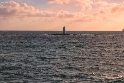 Scenic view of sea against sky during sunset
