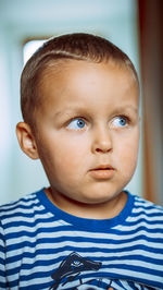 Portrait of cute boy looking away