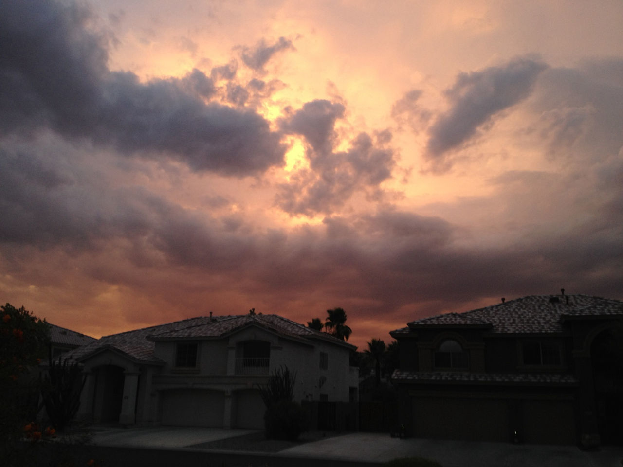 building exterior, architecture, built structure, sky, house, cloud - sky, sunset, weather, cloudy, residential structure, residential building, overcast, cloud, roof, orange color, dramatic sky, nature, outdoors, snow, beauty in nature