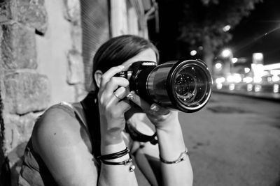 Woman photographing with camera