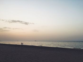 Scenic view of sea at sunset