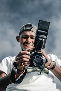 Portrait of man photographing