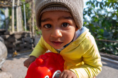 Portrait of cute boy wearing hat