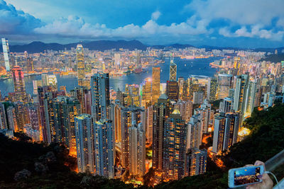 High angle view of modern buildings in city against sky