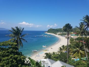 High angle view of swimming pool by sea against sky