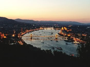 High angle view of bridge over river at night