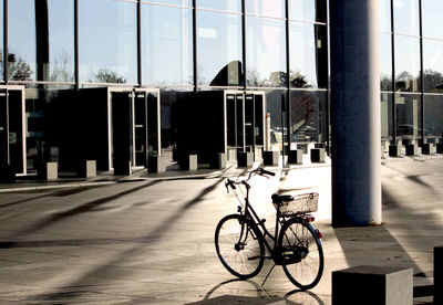 Bicycle against sky in city