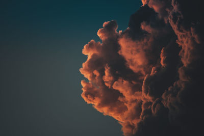 Low angle view of cloud against sky at sunset