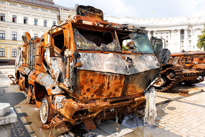 The military vehicle of the russian enemy burned by ukrainian troops is on display in  city squares
