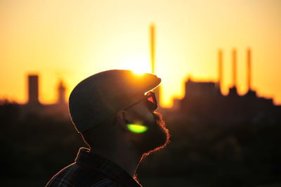 Young man enjoying the sunset. 