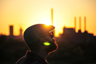 Portrait of man against sky during sunset