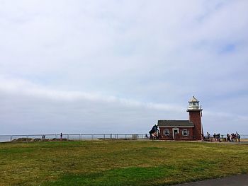 Built structure against cloudy sky