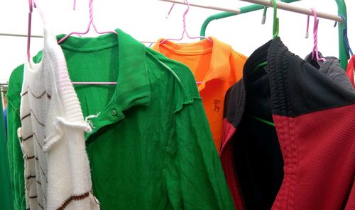 Close-up of clothes drying on rack