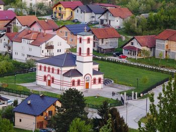 High angle view of houses and buildings in town