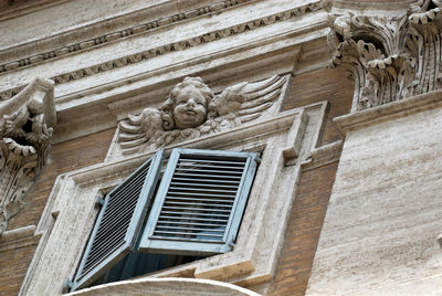 Low angle view of old statue at basilica di santa maria maggiore