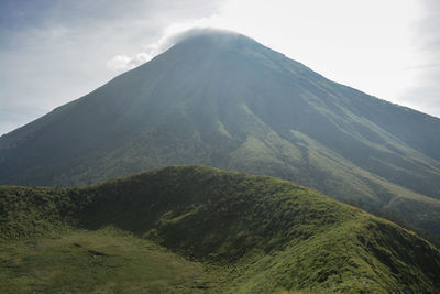 Scenic view of volcanic landscape against sky