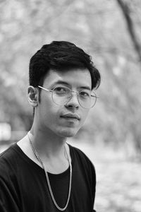 Portrait of young man wearing eyeglasses