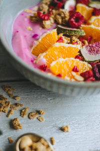 Close-up of orange slice in bowl