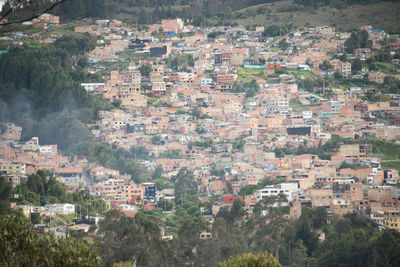 High angle view of townscape and trees in city