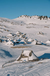 Scenic view of snow covered mountain against sky