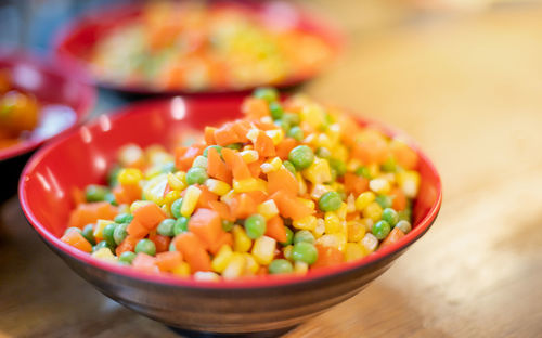 High angle view of chopped vegetables in bowl on table