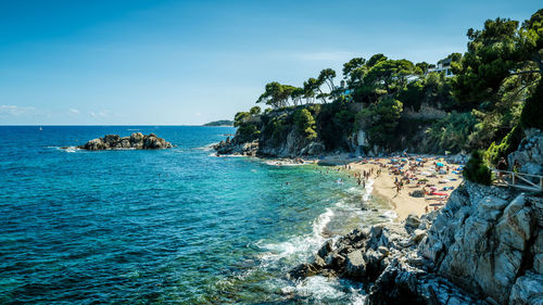 Scenic view of sea against blue sky