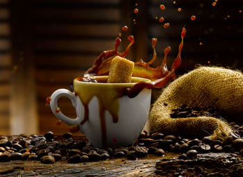 Close-up of coffee beans on table