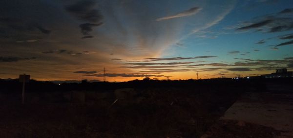 Scenic view of dramatic sky during sunset