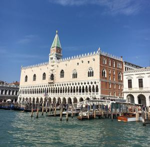 Doge palace and san marco campanile against sky