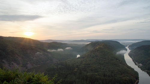 Scenic view of mountains against sky during sunset