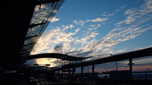 Low angle view of bridge against sky during sunset