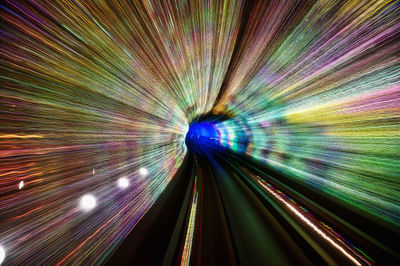 Light trails on illuminated tunnel