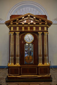 Exterior of clock against sky