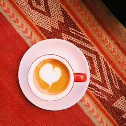 High angle view of cappuccino on table