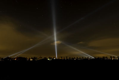 Scenic view of illuminated sky at night