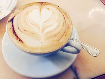 Close-up of cappuccino on table