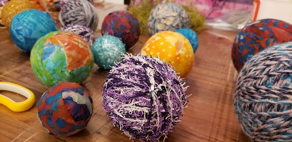 Close-up of multi colored candies on table
