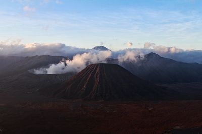 Smoke emitting from volcanic mountain