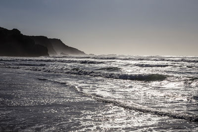 Scenic view of sea against clear sky